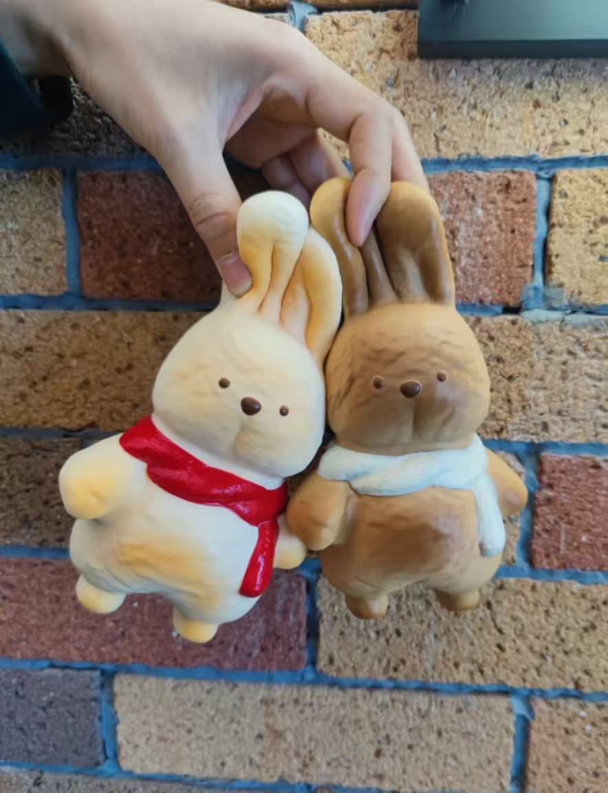 Huge bunny w lil cutie
